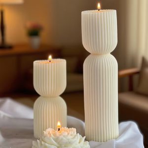 vela pilar a rayas aromática